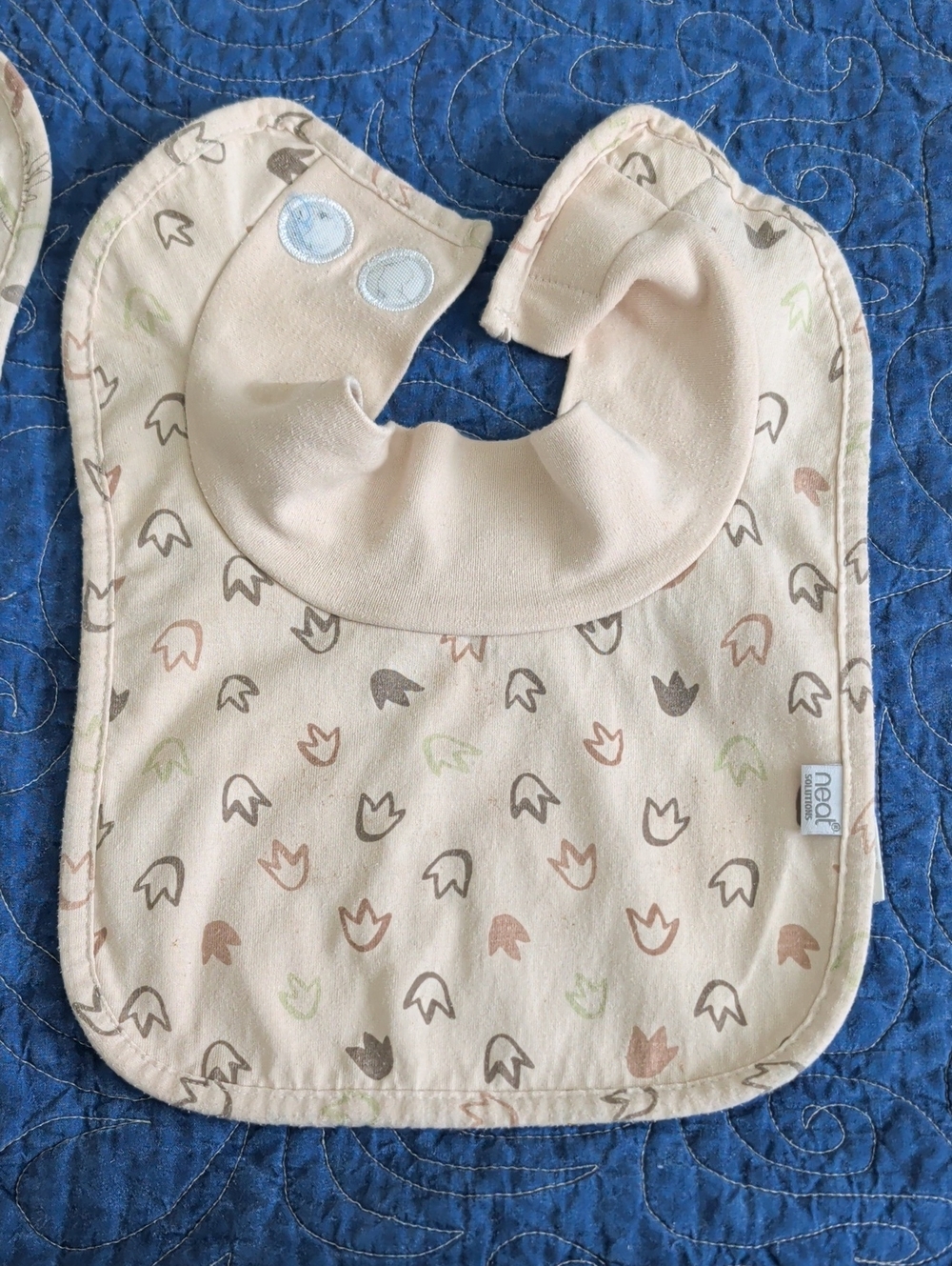 Neat Dinosaur Print Bib